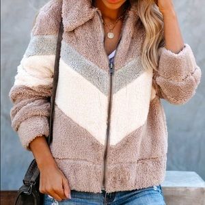 Sherpa zip up jacket with chevron pattern. Size Medium